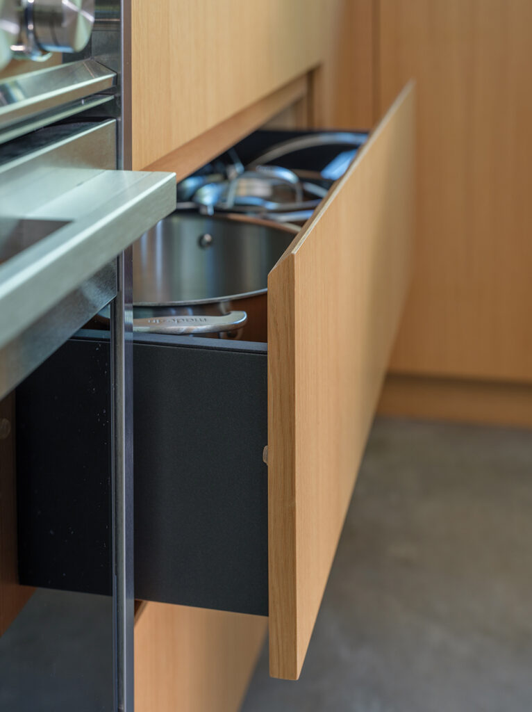 A cabinetry detail shot inside the Westwood house: a modern, minimalist, luxury home designed by Kansas City based Hoke Ley Architecture and Design.