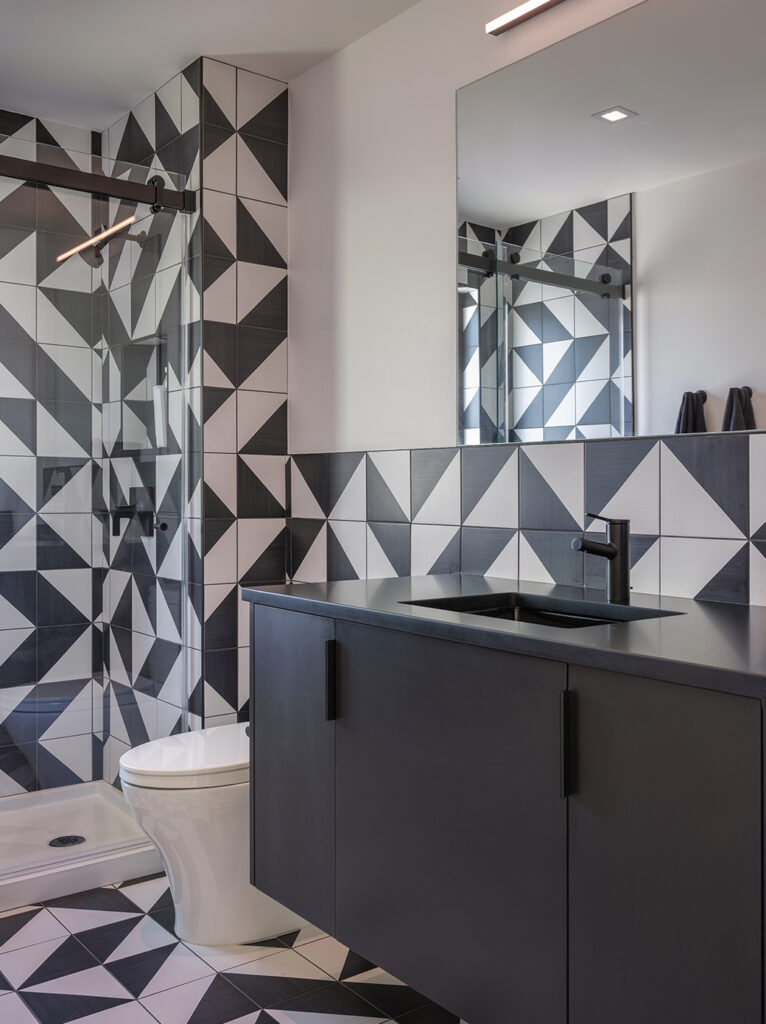 A detail shot of the black and white tile work inside the Westwood house: a modern, minimalist, luxury home designed by Kansas City based Hoke Ley Architecture and Design.