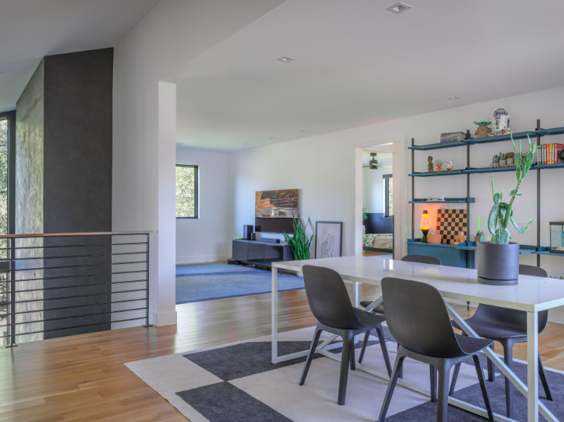 A wide shot of the loft inside the Westwood house: a modern, minimalist, luxury home designed by Kansas City based Hoke Ley Architecture and Design.